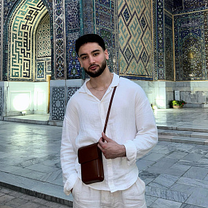 Алишер Асламов